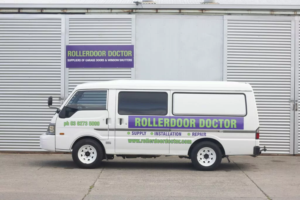 Rollerdoor Doctor branded van. 