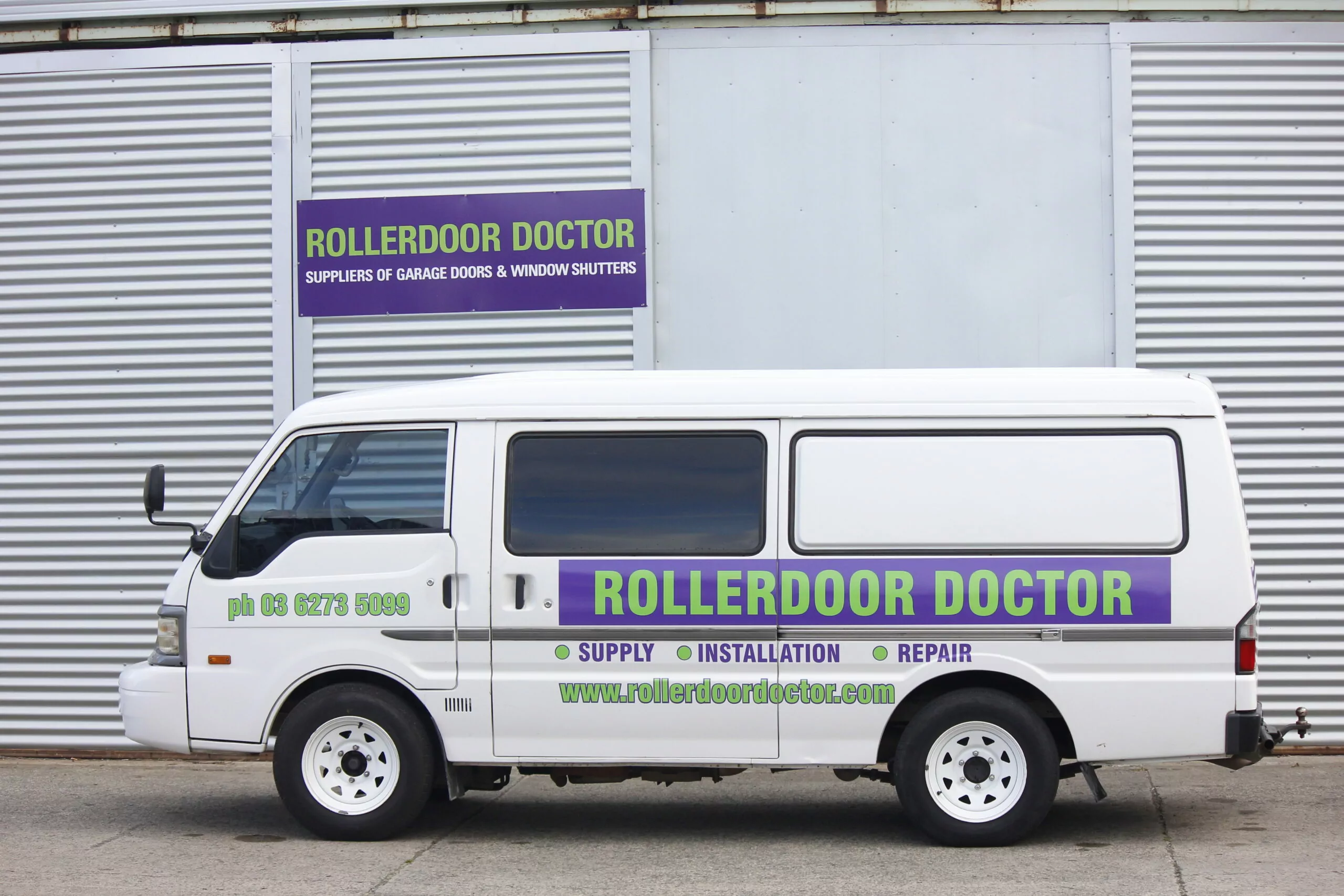 Rollerdoor Doctor roller door installation in branded van